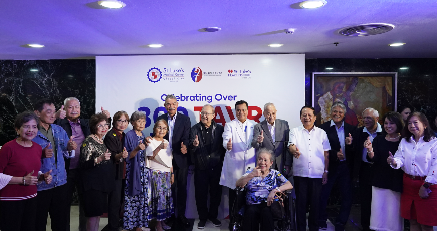 Dr. Fabio Enrique Posas, Head of St. Luke's Center for Structural Heart and Vascular Interventions, and&nbsp;Dr. Dennis P. Serrano, St. Luke's Medical Center President and CEO (8th and 10th from left respectively),&nbsp;join TAVR patients during the 300-TAVR milestone celebration.