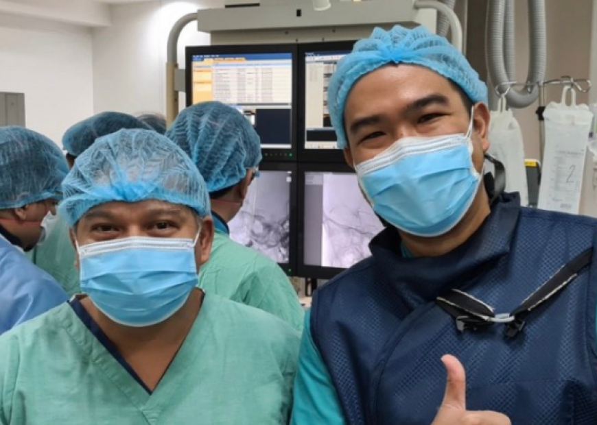 Attending physician Dr. Andrei Martin (right) together with Dr. Dennis Villanueva (left) who led the Interventional Radiology Team’s successful completion of the IAC procedure. 